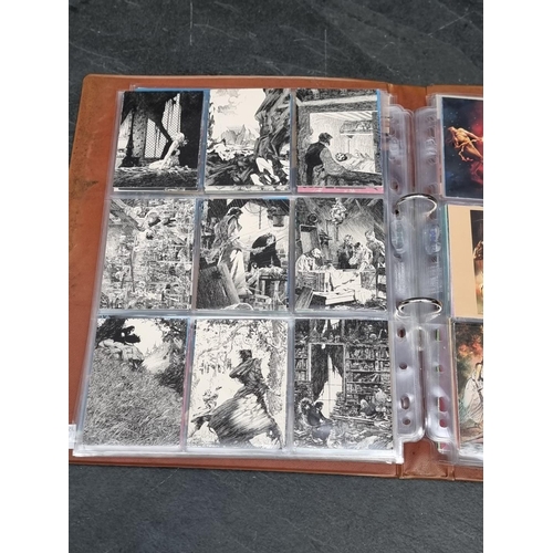 1298 - Comic Images: a binder containing a large quantity of collectors cards; together with three sea... 