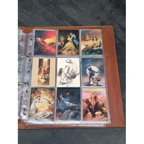 1298 - Comic Images: a binder containing a large quantity of collectors cards; together with three sea... 