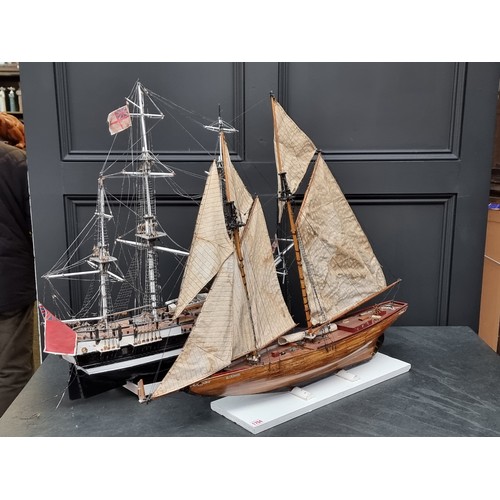 1704 - Two old model ships, each approx 85cm long.