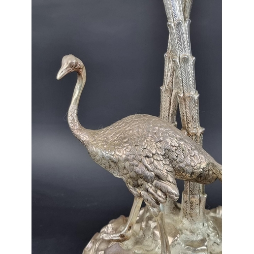 10A - An impressive silver plated centrepiece, by Elkington & Co, modelled as an ostrich beneath palm ... 