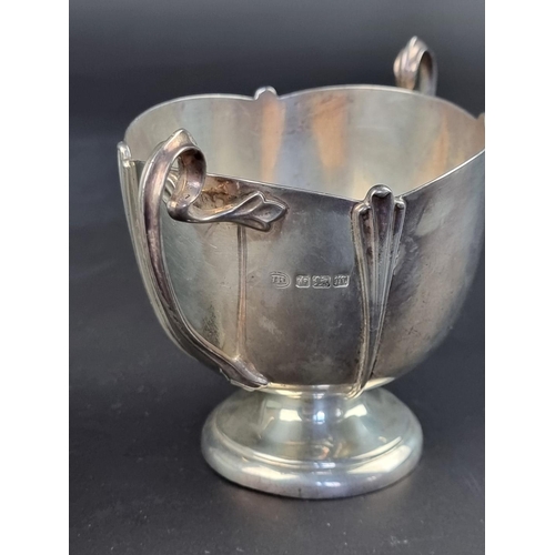 12 - An Edwardian silver twin handled bowl, by John Round & Son Ltd, Sheffield 1904, height to handle... 