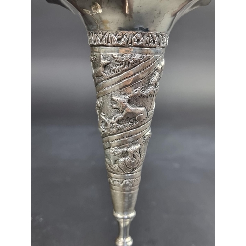 14 - A pair of early 20th century Indian white metal vases, 17cm high, weighted.