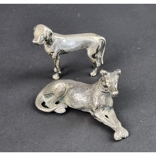 172 - Two silver models of dogs, by S M C, London 1975, comprising a Hound, 7cm wide; and a Labrador, 186g... 