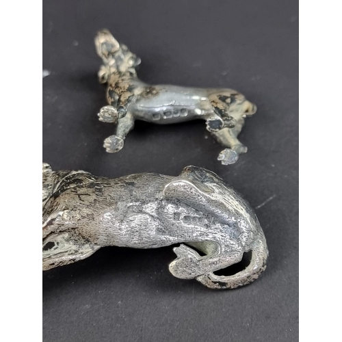 172 - Two silver models of dogs, by S M C, London 1975, comprising a Hound, 7cm wide; and a Labrador, 186g... 