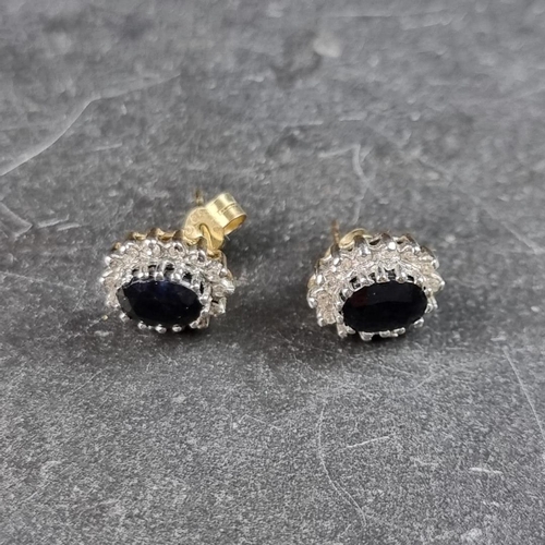 327 - A pair of 9ct gold sapphire and diamond cluster ear studs, 11 x 9mm.