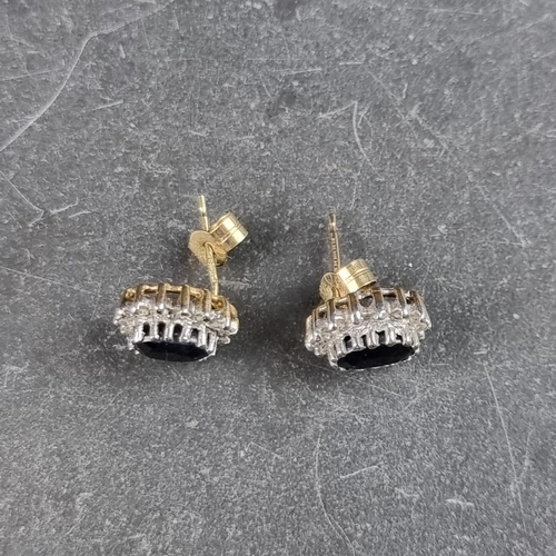 327 - A pair of 9ct gold sapphire and diamond cluster ear studs, 11 x 9mm.