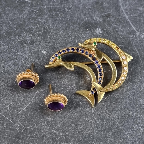 328 - An 18ct gold dolphin brooch, set coloured gemstones, London 1992, 32mm high, gross weight 7.9g; toge... 