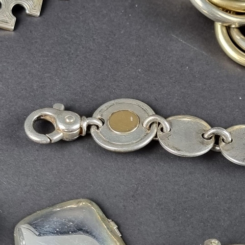 456 - An Italian white metal bracelet, stamped 925, with one inset yellow metal disk stamped 750, 20cm; to... 