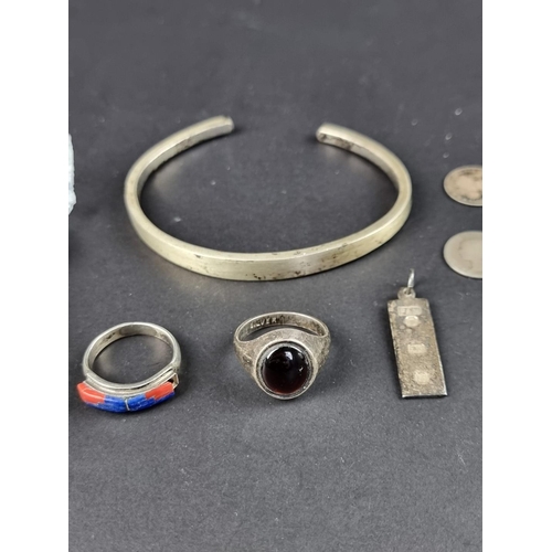 465 - A silver bangle; together with four items of white metal jewellery, a silver I D bracelet; six GB si... 