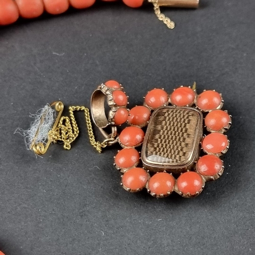 471 - A Victorian coral single strand bead necklace, having 56 semi round beads fastened with a yellow met... 