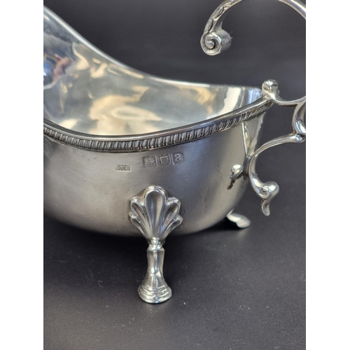 5 - A pair of Victorian silver sauce boats, by Josiah Williams & Co, London 1896, height to han... 