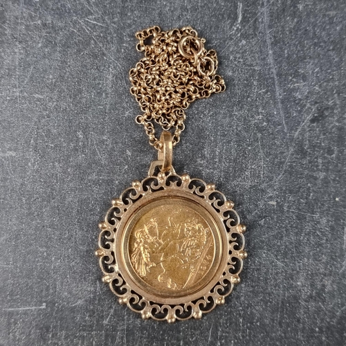 513 - Coins: an Elizabeth II 1974 gold sovereign, in 9ct gold pendant mount, with a yellow metal chain sta... 