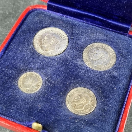 524 - Coins: a George VI 1945 Maundy Set, in original case.