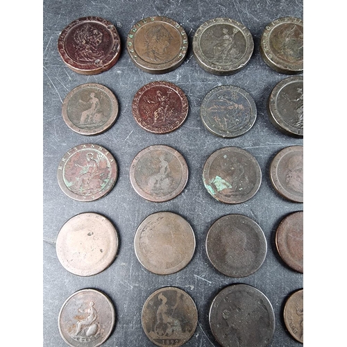 537 - Coins: a group of thirty four Georgian and later copper coins, to include seven George III 1797 cart... 