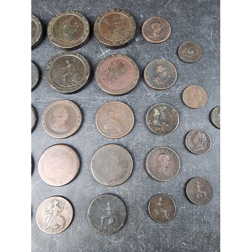 537 - Coins: a group of thirty four Georgian and later copper coins, to include seven George III 1797 cart... 