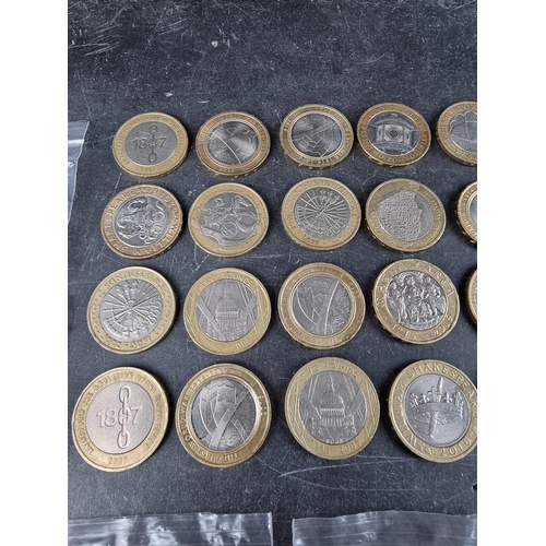 539 - Coins: fifty five collectable circulated £2 coins.