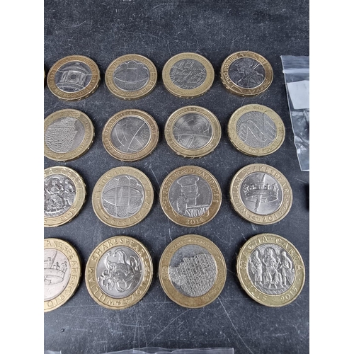 539 - Coins: fifty five collectable circulated £2 coins.