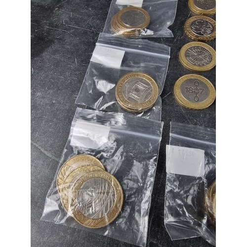 539 - Coins: fifty five collectable circulated £2 coins.