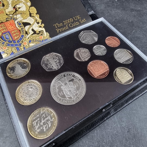 542 - Coins: a cased Royal Mint 2009 proof coin set, containing twelve coins, to include the Kew Gardens 5... 