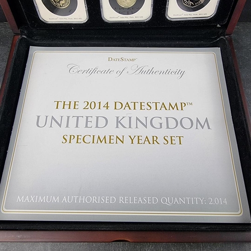 544 - Coins: a 2014 Datestamp UK Specimen Year Set, containing twelve coins from 1p to £5, with booklet, c... 