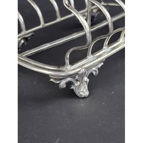 61 - A Victorian silver toast rack, makers mark rubbed, London 1849, 17cm wide, 279g.