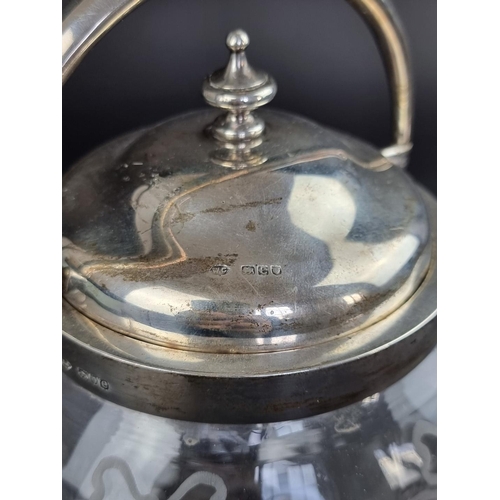 62 - A Victorian silver mounted glass biscuit barrel, by William Comyns & Sons, London 1900, hei... 