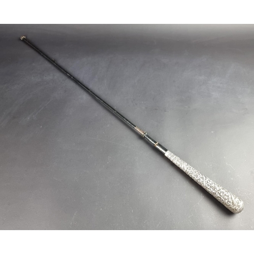 65 - An Eastern white metal mounted parasol handle.