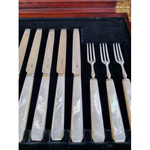 67 - A cased set of twelve silver and mother-of-pearl fruit knives and forks, by Mappin & Webb Ltd, L... 