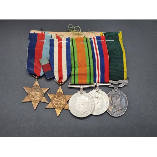 161 - Medals: a WWII group of five, to include a Territorial Efficiency Medal, to 7607267 Pte N.F Cosgrove... 