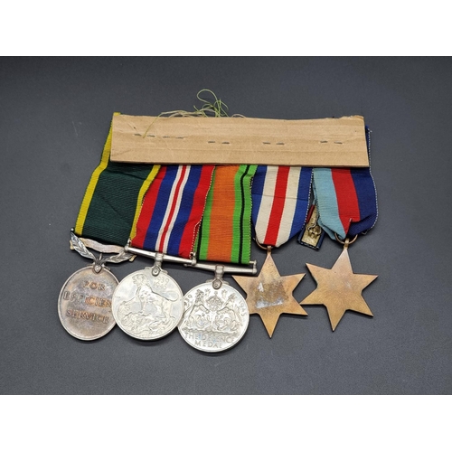 161 - Medals: a WWII group of five, to include a Territorial Efficiency Medal, to 7607267 Pte N.F Cosgrove... 