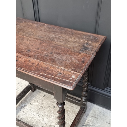 1001 - A late 17th century oak table, 69cm wide, (alterations).