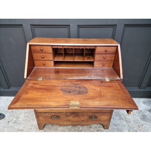 1003 - A George III mahogany bureau, 92cm wide.