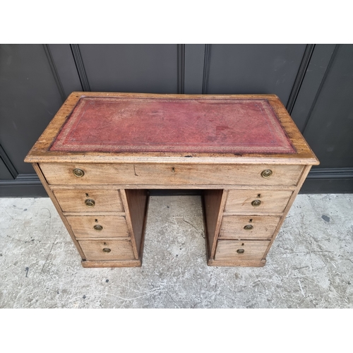 1004 - A late George III mahogany desk, 102.5cm wide.