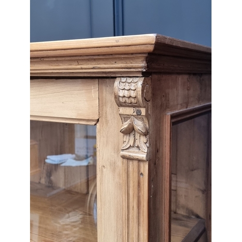 1009 - A 19th century continental pine display cabinet, 102cm wide.