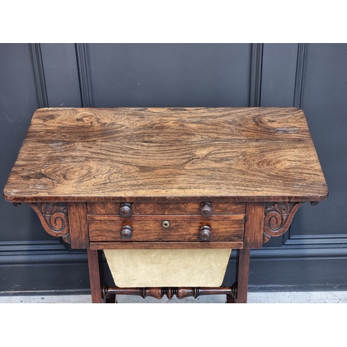 1024 - A George IV rosewood work table, 71.5cm wide.