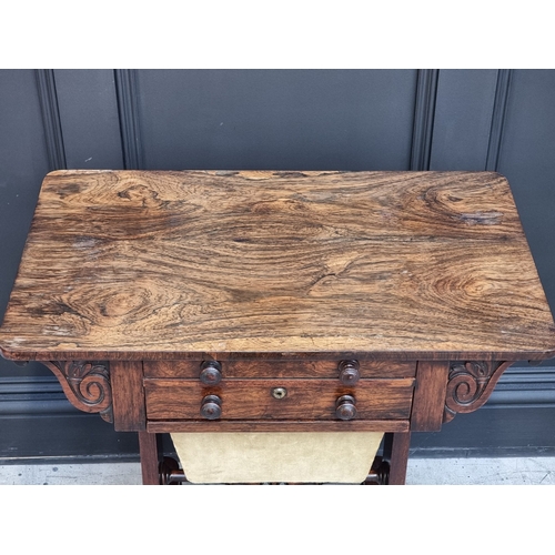 1024 - A George IV rosewood work table, 71.5cm wide.