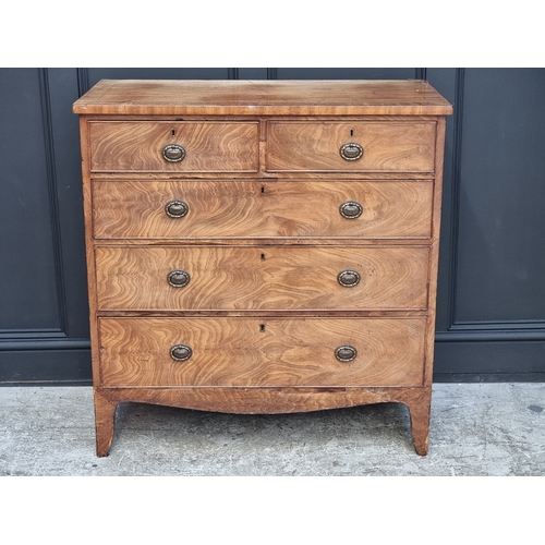 1031 - An early 19th century mahogany and crossbanded chest of drawers, 100.5cm wide.