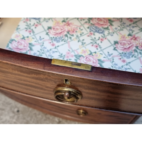 1038 - An early 19th century mahogany and satinwood crossbanded bowfront chest of drawers, 105.5cm wide.... 