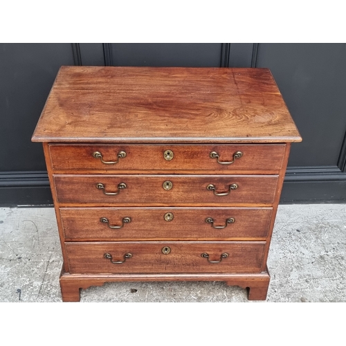 1044 - A small George III mahogany four drawer chest, 81.5cm wide.