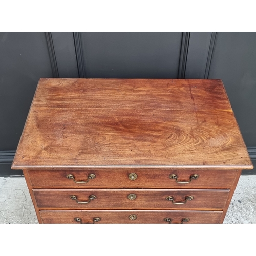 1044 - A small George III mahogany four drawer chest, 81.5cm wide.