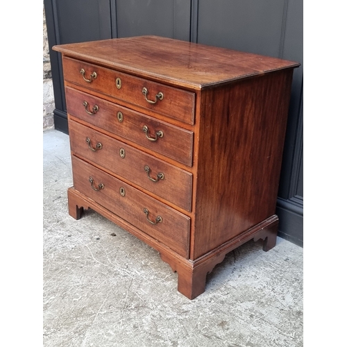 1044 - A small George III mahogany four drawer chest, 81.5cm wide.