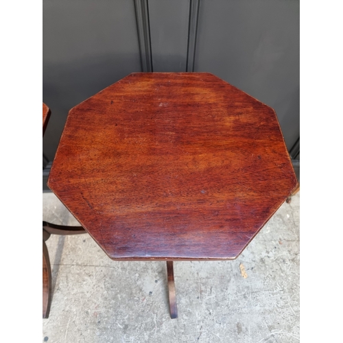 1050 - A pair of mahogany octagonal tripod tables, 40.5cm wide.