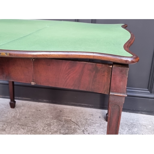 1051 - A George III figured mahogany and crossbanded serpentine concertina card table, 91.5cm wide.... 