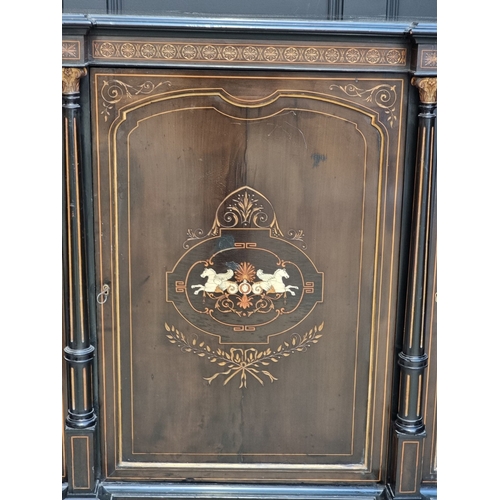 1054 - A mid-Victorian ebonized credenza, incorporating bone inlay, 172cm wide.