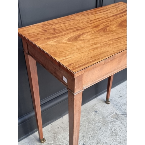 1056 - A small antique satinwood and line inlaid single drawer side table, 62.5cm wide.