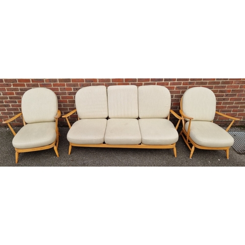 1059 - A vintage Ercol Windsor 203 settee and matching pair of armchairs, with blue stickers. (3)... 