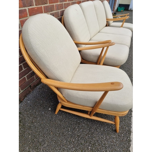 1059 - A vintage Ercol Windsor 203 settee and matching pair of armchairs, with blue stickers. (3)... 