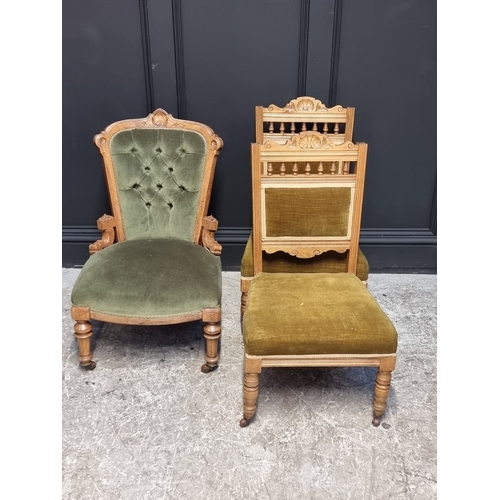 1064 - A Victorian walnut nursing chair; together with another pair of Victorian walnut low salon chairs. (... 