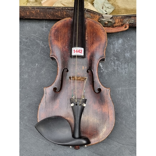 1442 - An antique Continental violin, with 14 1/4in two-piece back, in padded case.