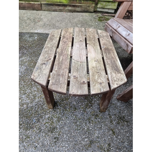 1453 - A pair of pine garden armchairs and matching oval table, 79cm wide.